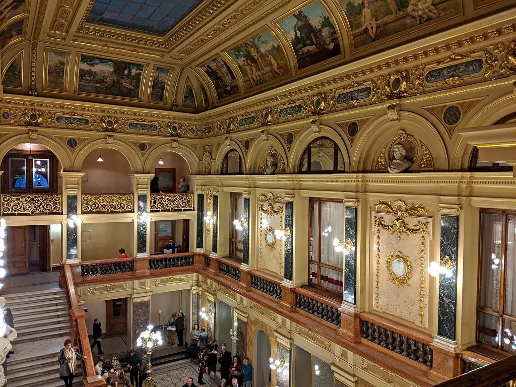 The ornate ceiling of the Lviv Opera House foyer