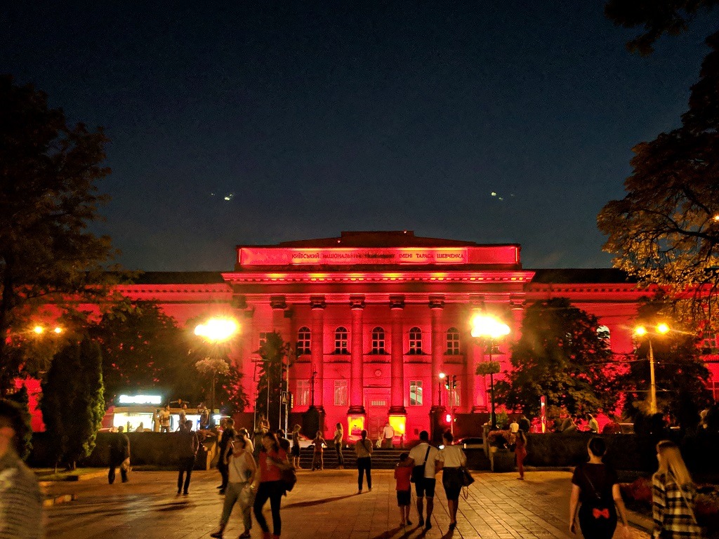 Taras Shevchenko University lit up red at night