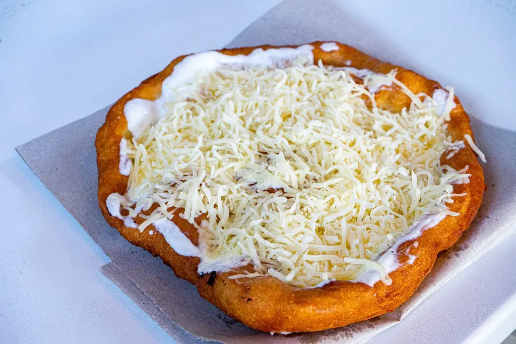 Must Try Food In Hungary: Langos (Deep fried flat bread)